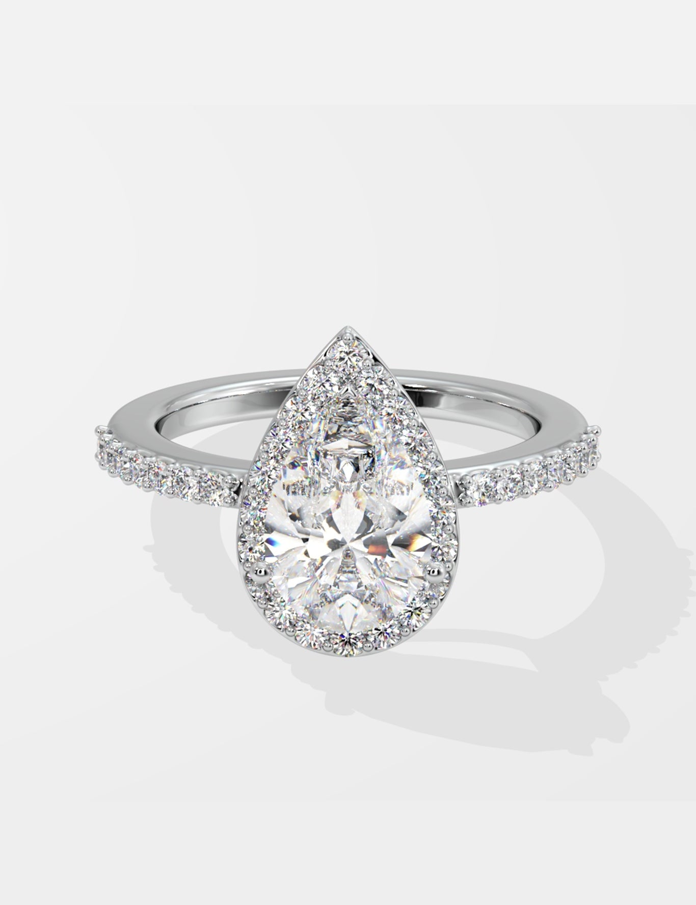 Askew Pear Solitaire Halo Ring - House Of Quadri