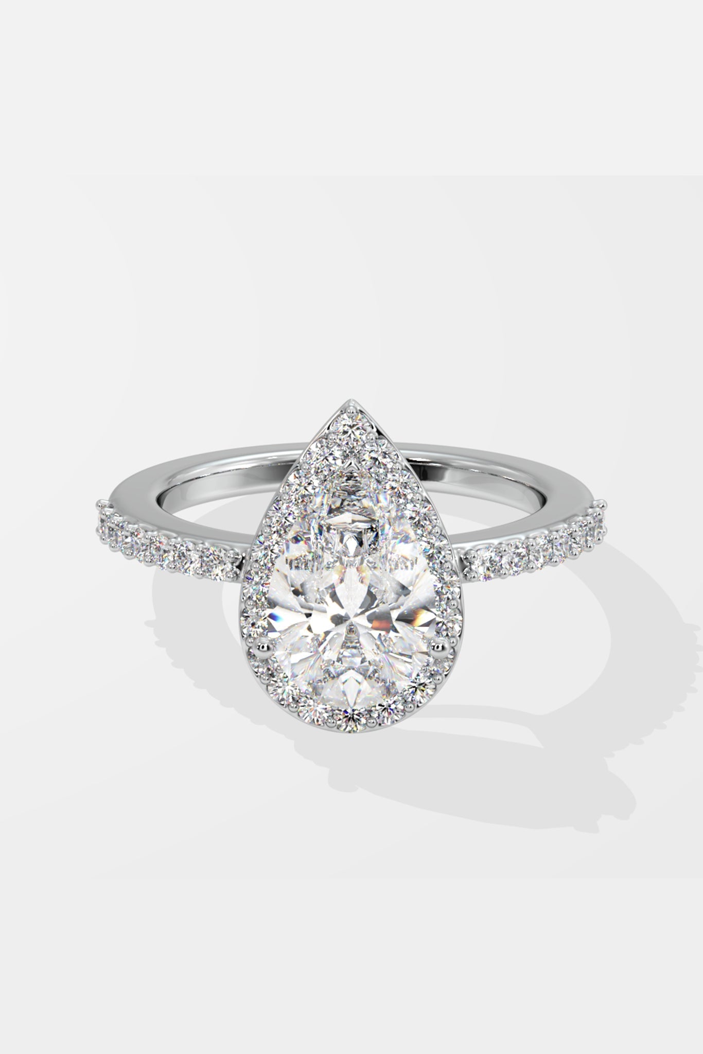 Askew Pear Solitaire Halo Ring - House Of Quadri