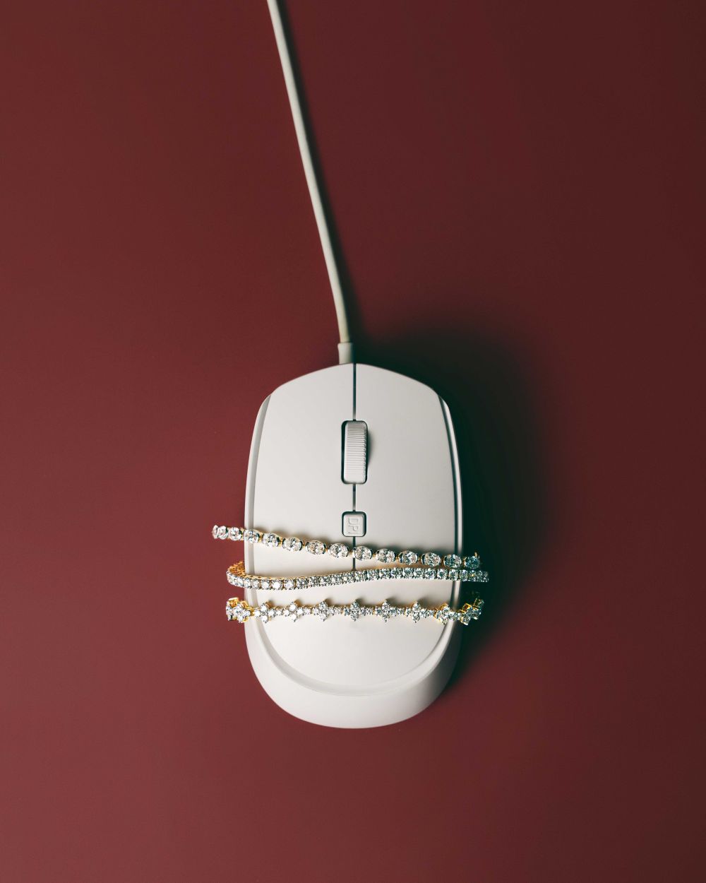 Lab Grown Diamond Tennis Bracelets on White Computer Mouse