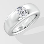 Silver ring with a solitaire diamond on a light gray background