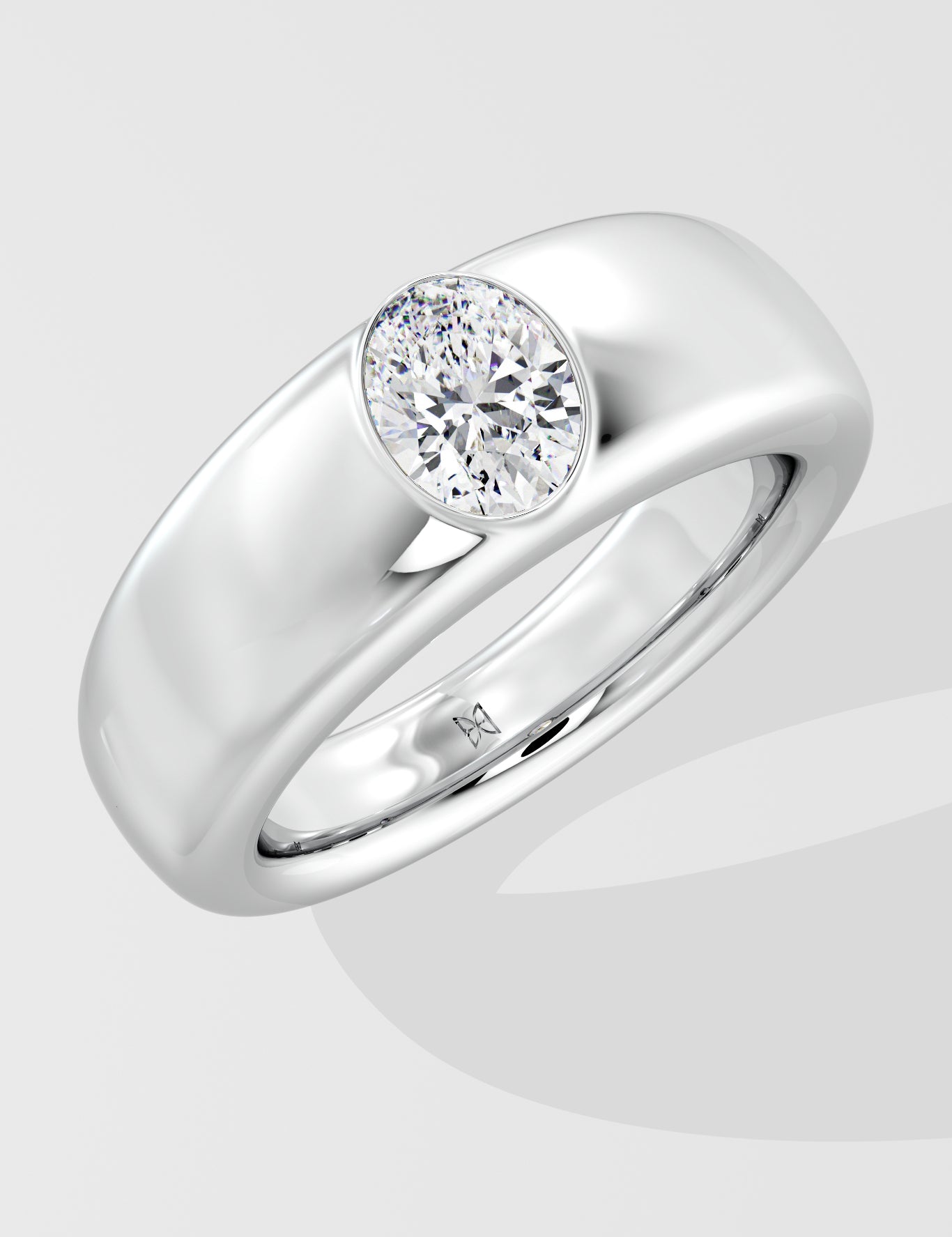 Silver ring with a solitaire diamond on a light gray background