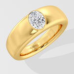 Gold ring with a solitaire diamond on a light gray background