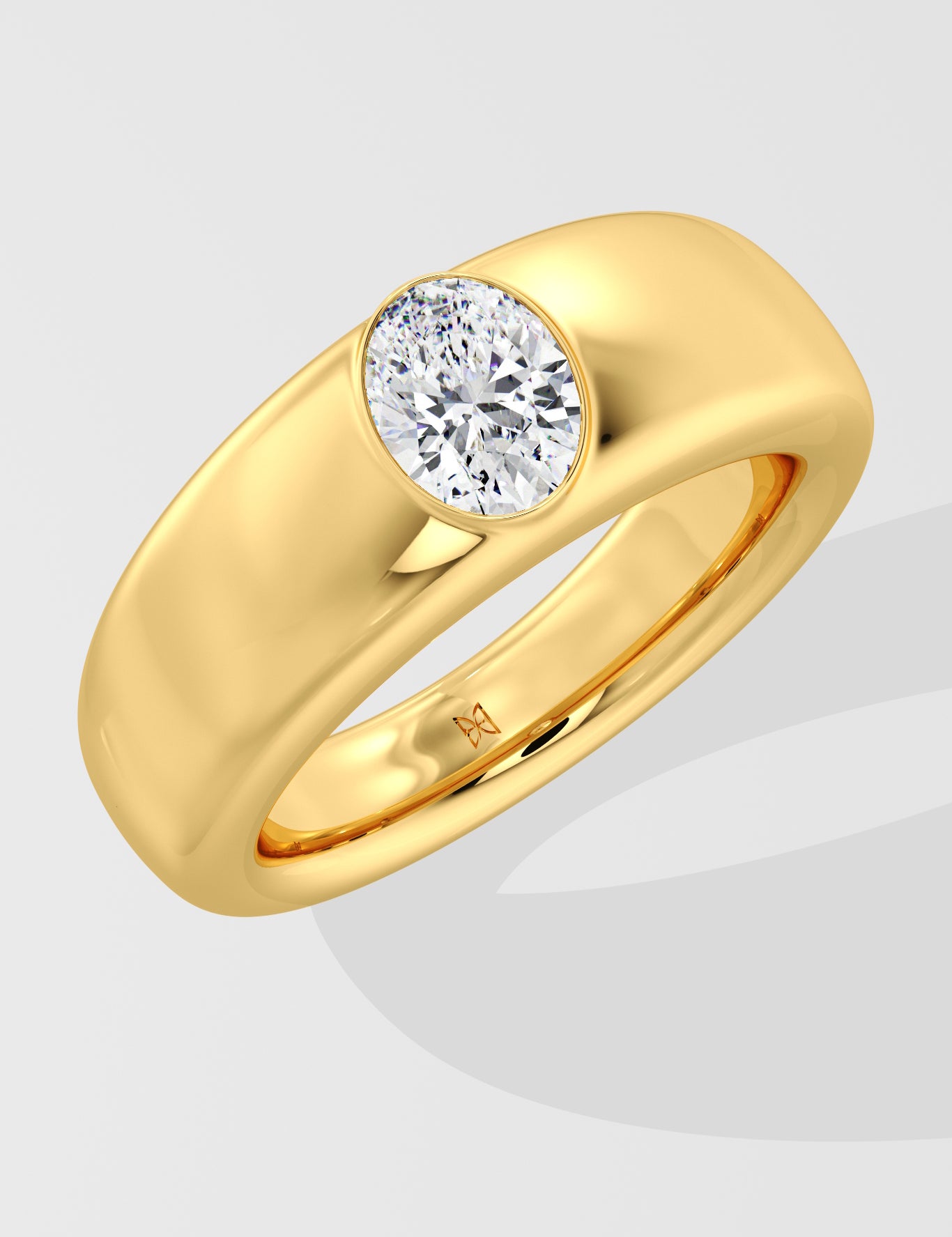 Gold ring with a solitaire diamond on a light gray background
