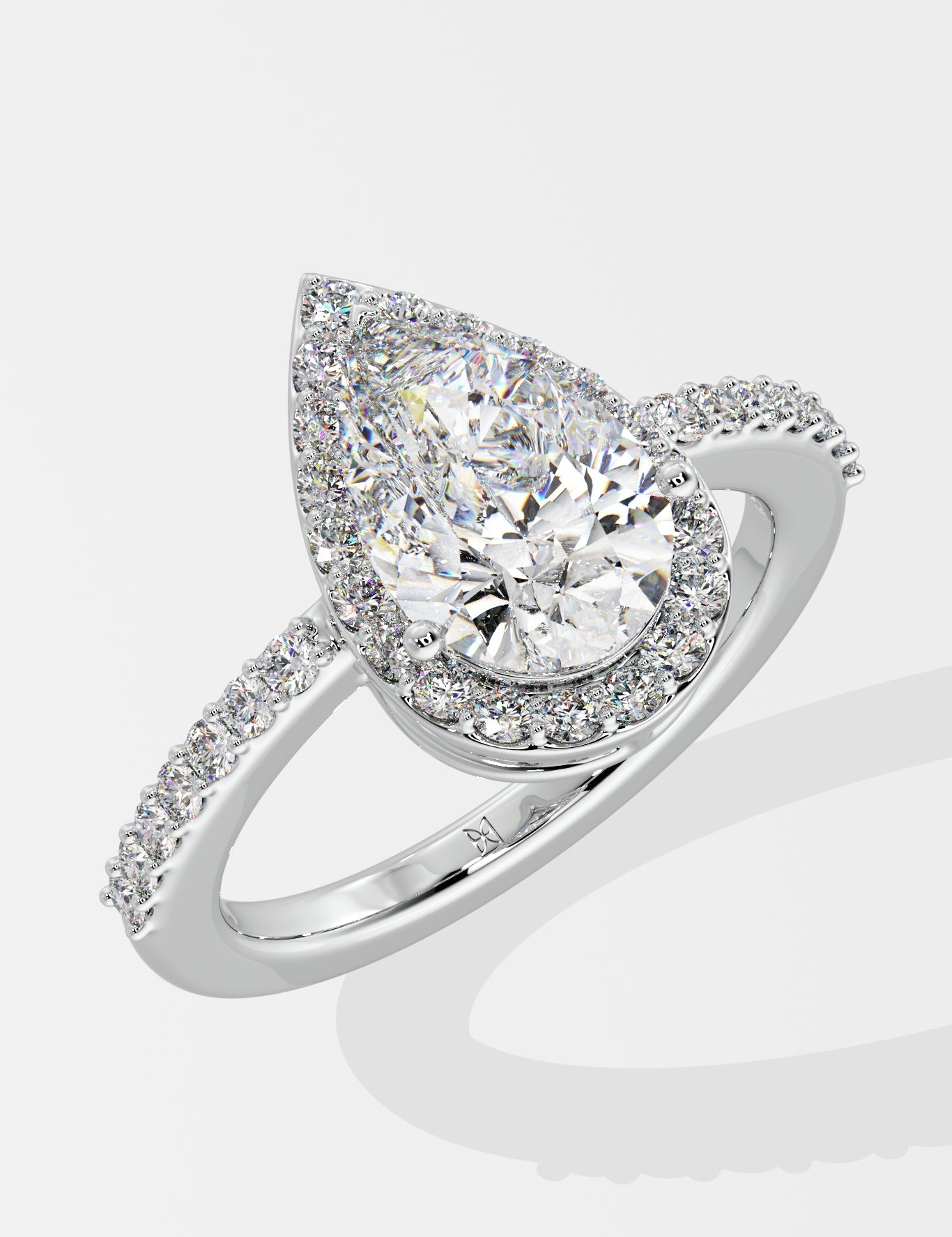 Askew Pear Solitaire Halo Ring - House Of Quadri