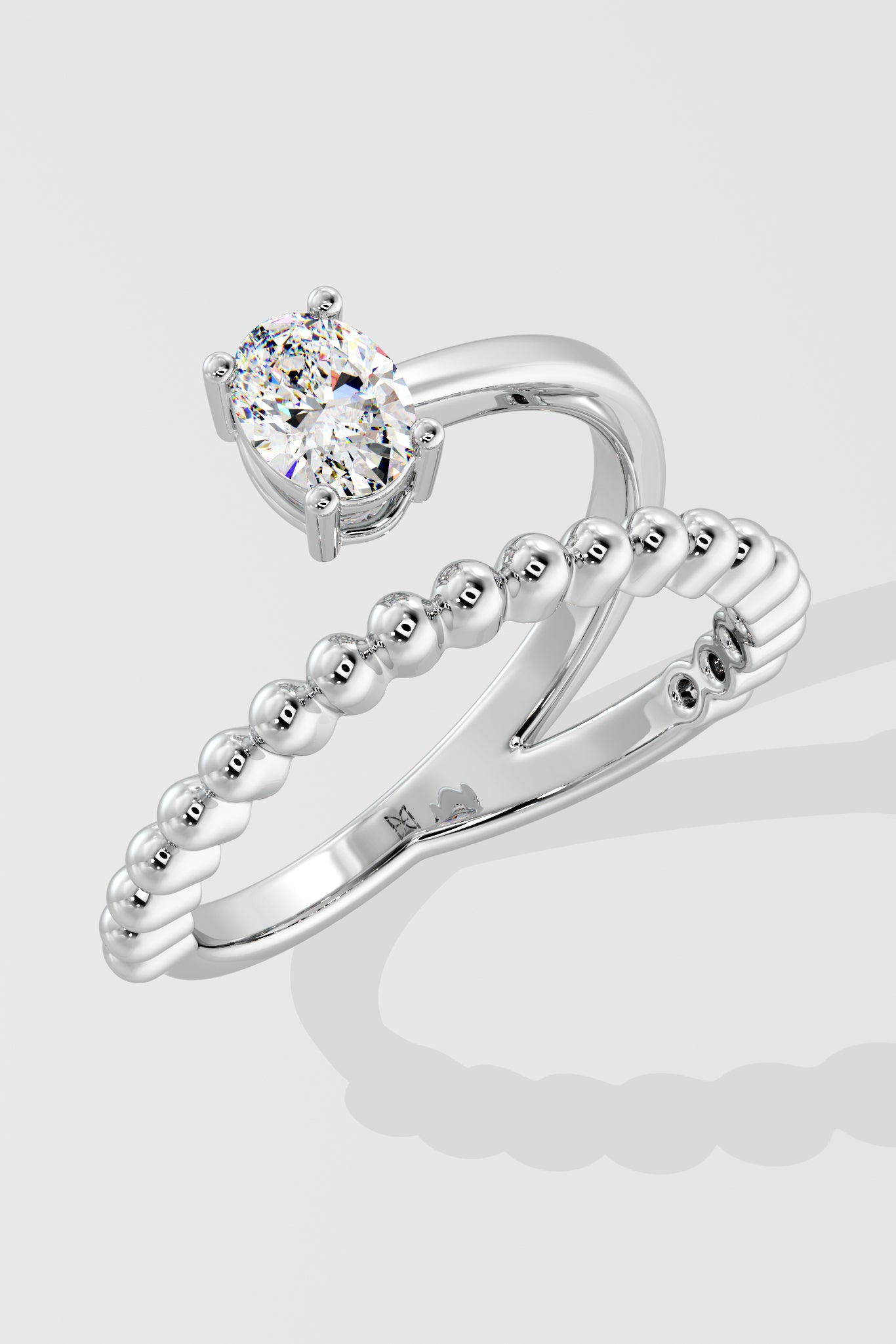 Mini Swirl Oval Solitaire Ring