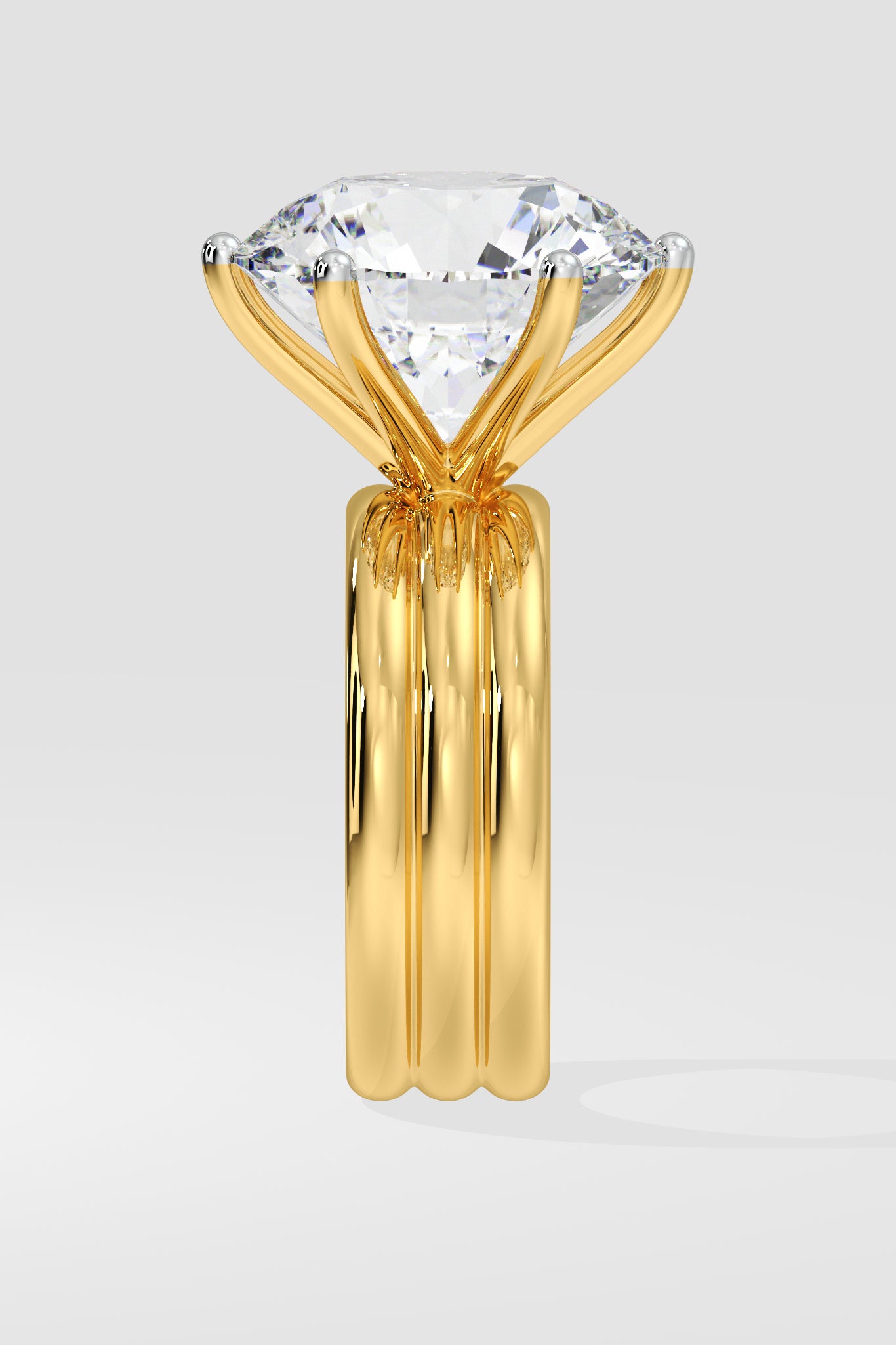 Gold diamond ring with a large diamond on a light gray background