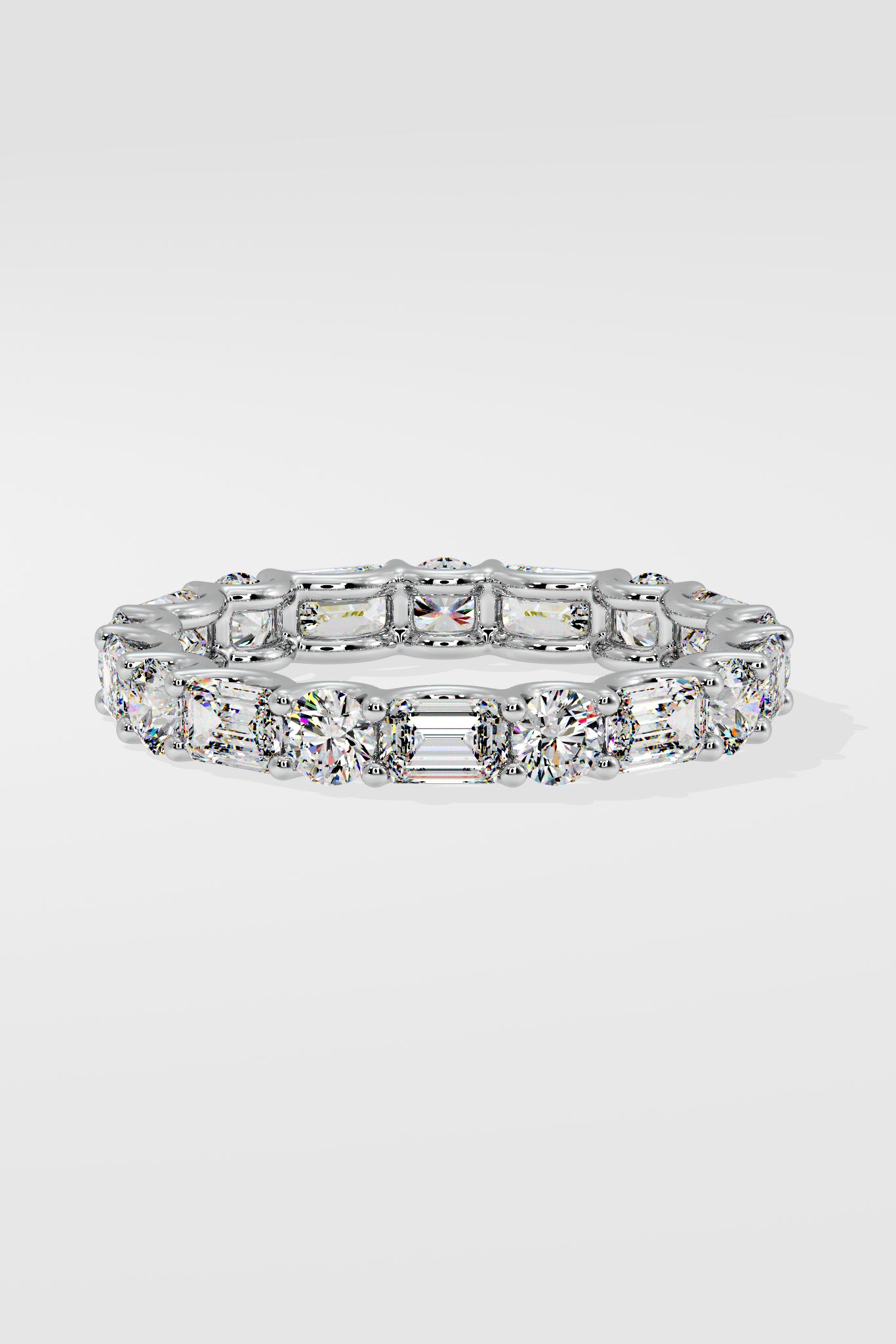 Round & Emerald Eternity Band