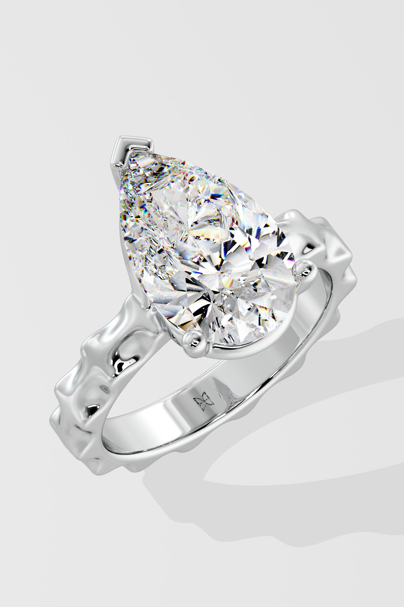 3 ct Pear Inegale Ring