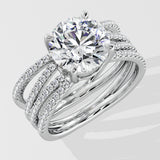 Silver ring with a large lab grown diamond on a white background