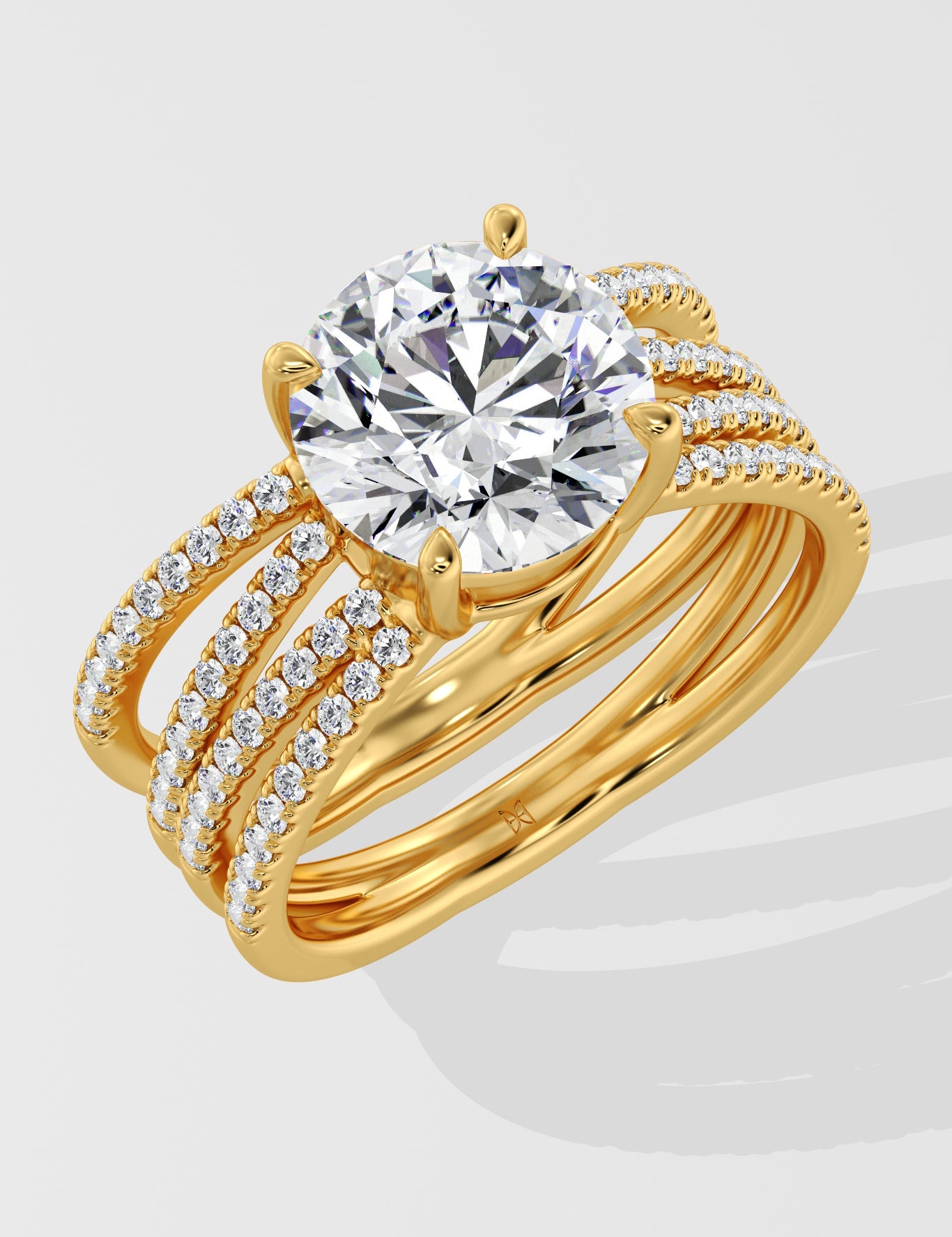 Gold ring with a large lab grown diamond and smaller diamonds on a white background