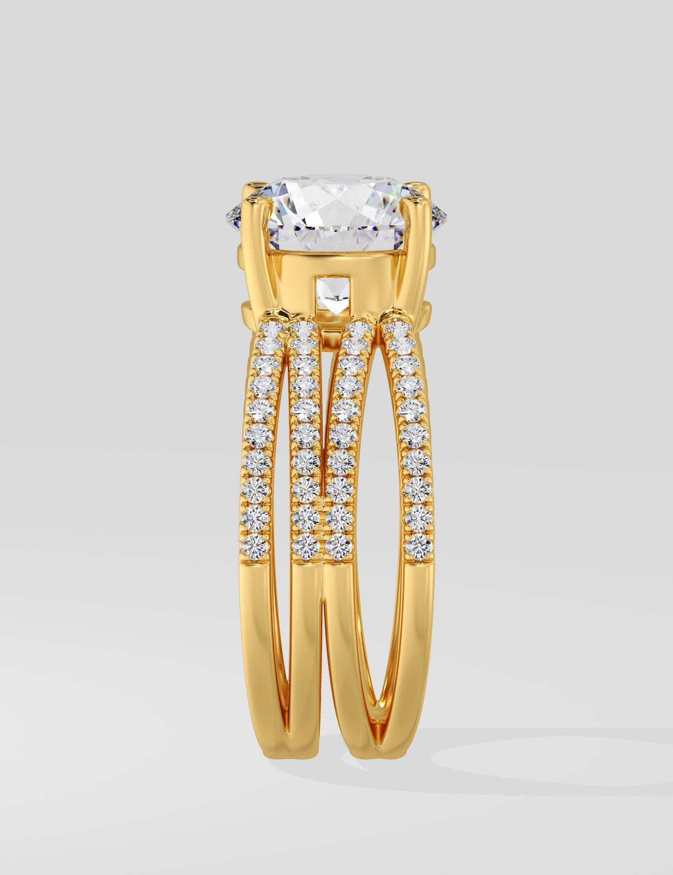 Gold ring with a large lab grown diamond and smaller stones on a light gray background