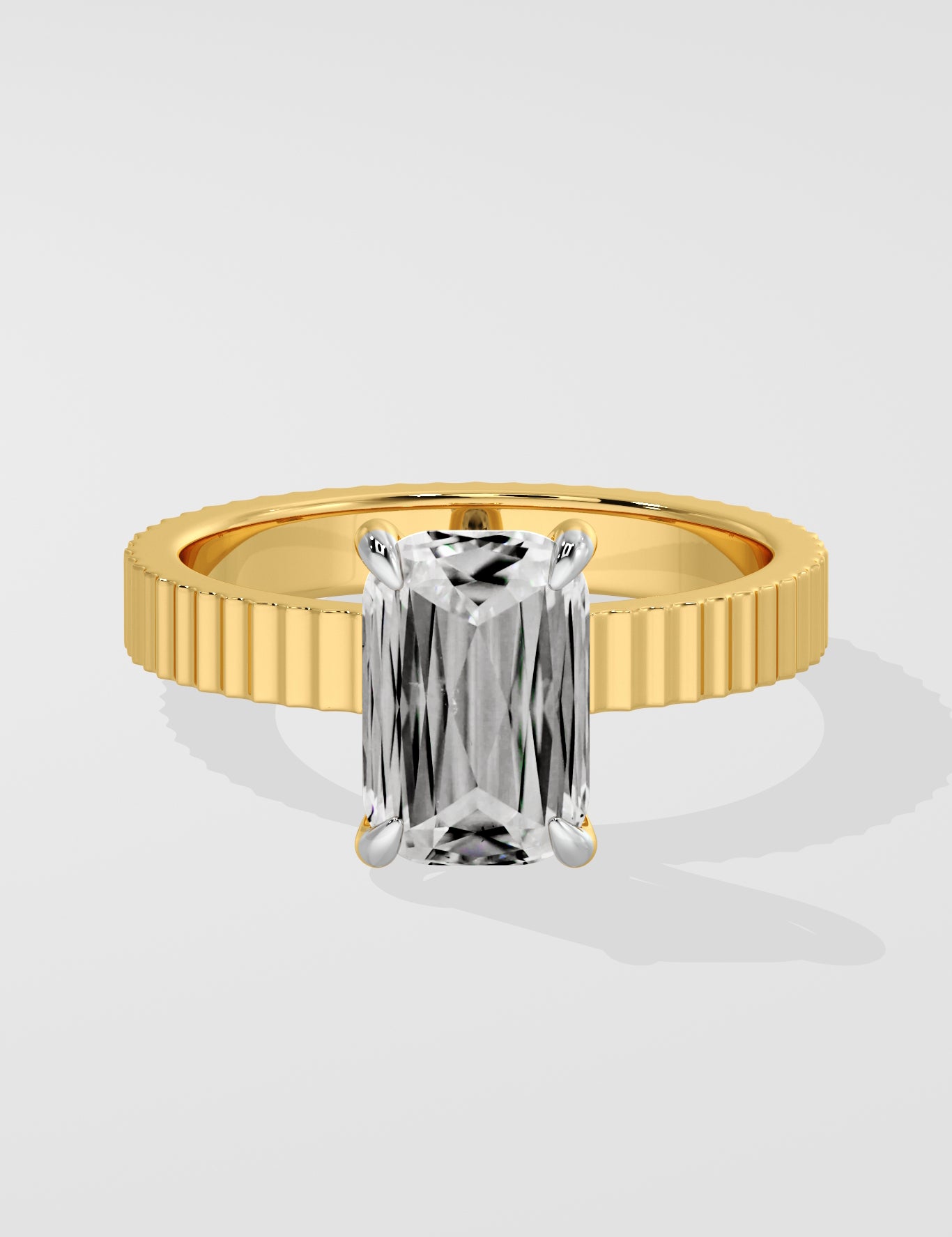 Diamond ring with a emerald diamond on a white background