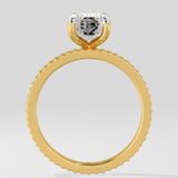 Diamond ring with a lab grown diamond on a light gray background