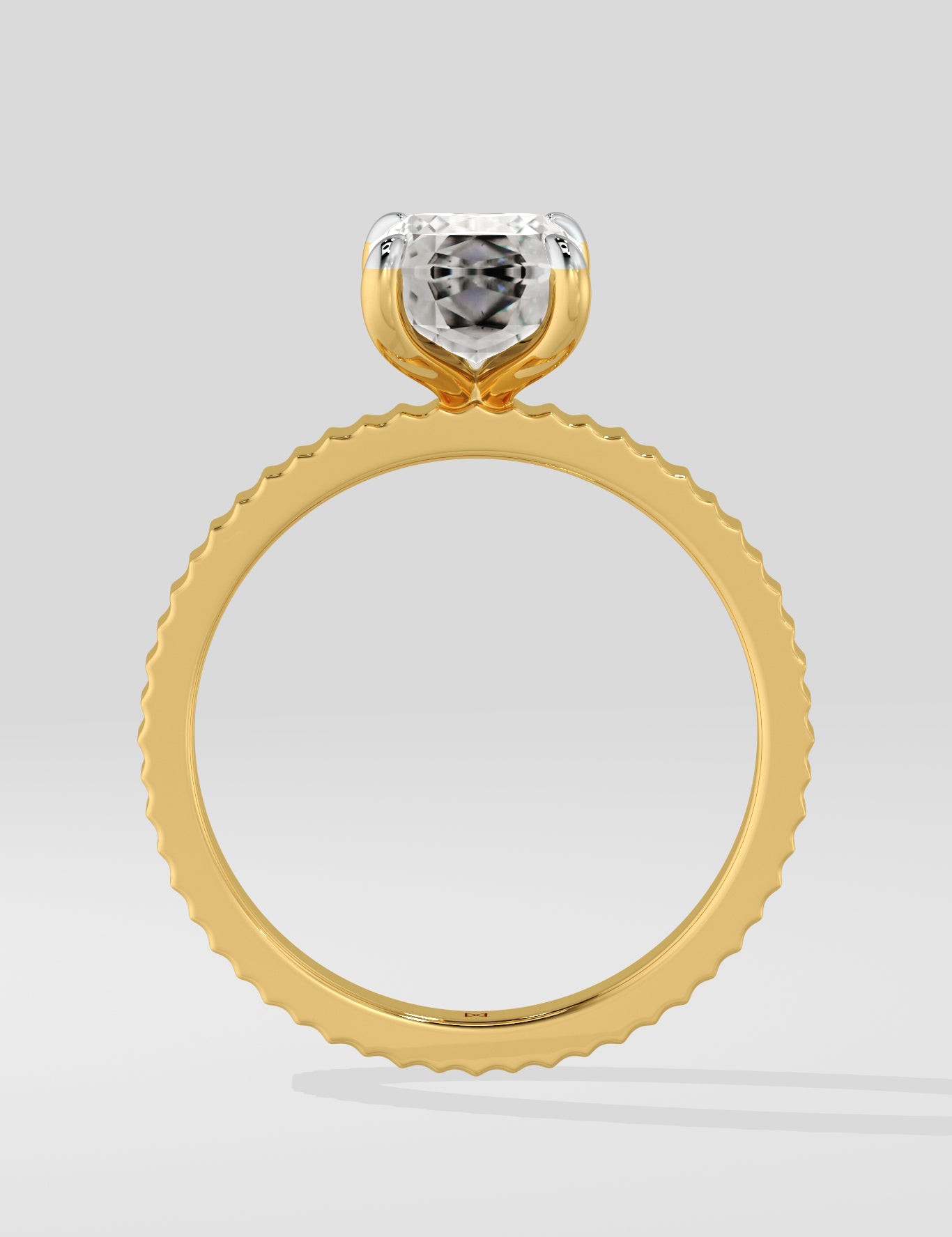 Diamond ring with a lab grown diamond on a light gray background