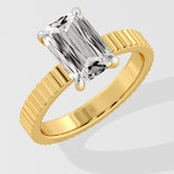 Diamond ring with a Emerald diamond on a white background