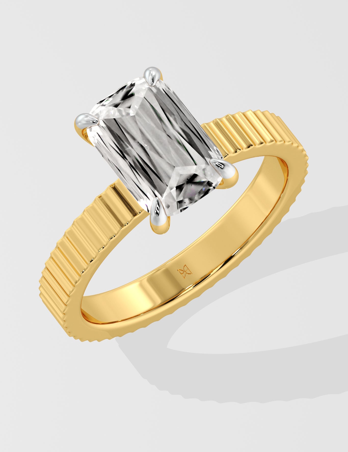 Diamond ring with a Emerald diamond on a white background