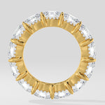 Diamond band ring on a light gray background