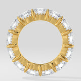 Diamond band ring on a light gray background