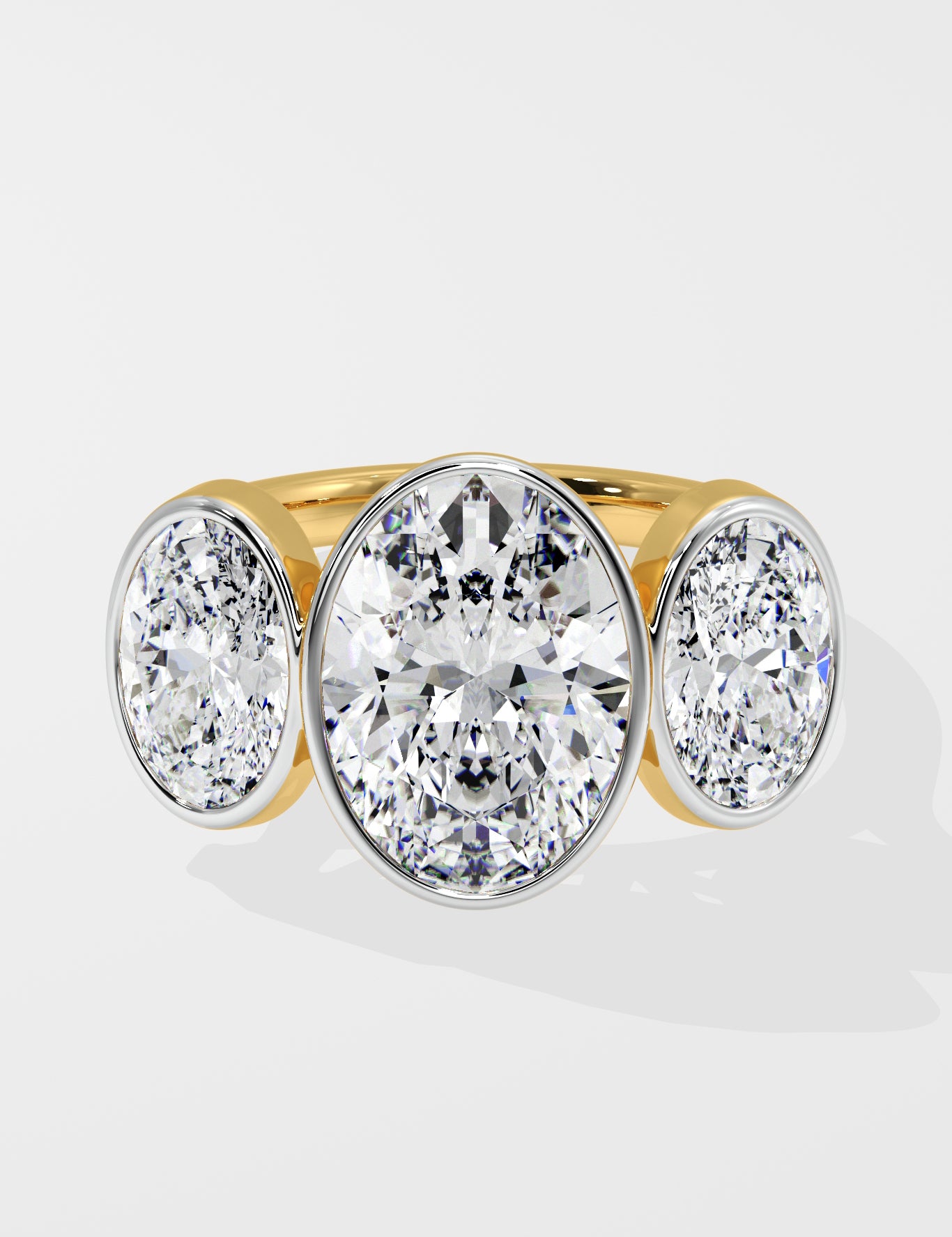 Gold Diamond ring with three round diamonds on a white background