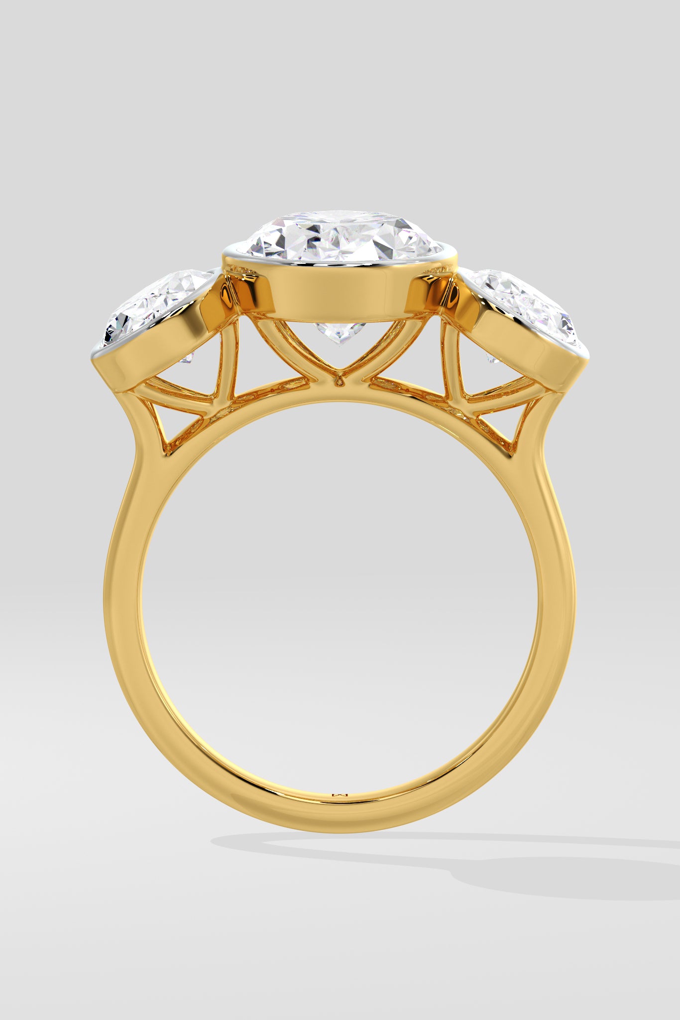 Gold Diamond ring with a large central gemstone and smaller stones on a light gray background