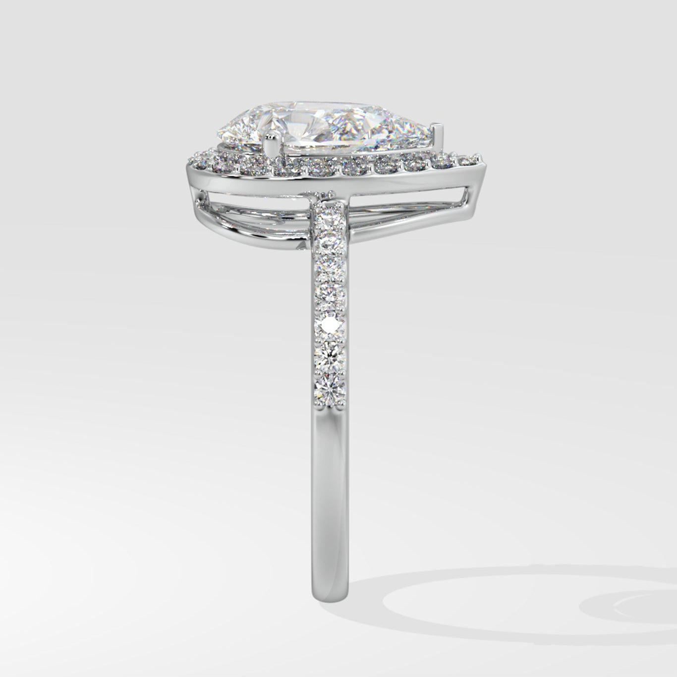 Askew Pear Solitaire Halo Ring - House Of Quadri