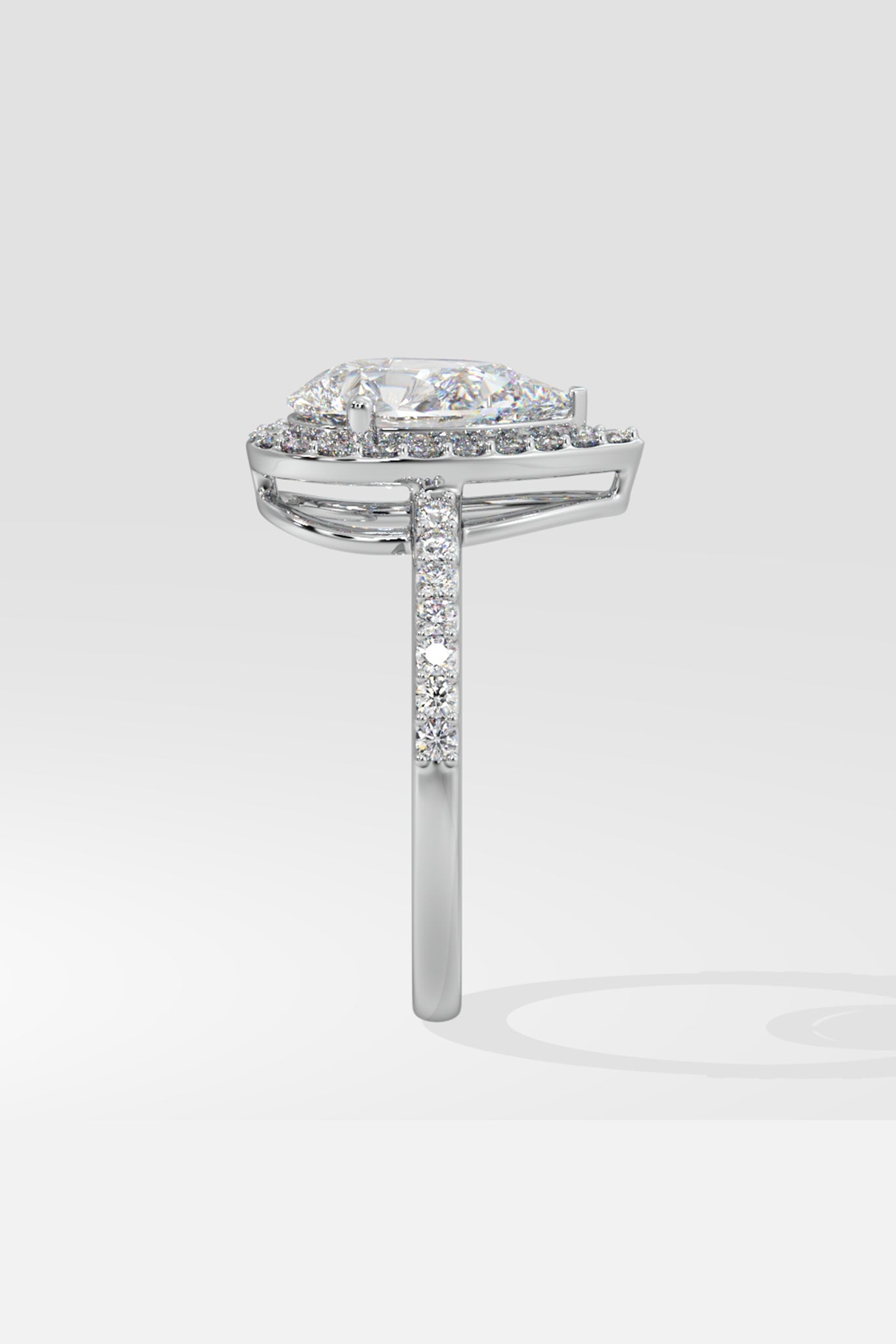 Askew Pear Solitaire Halo Ring - House Of Quadri